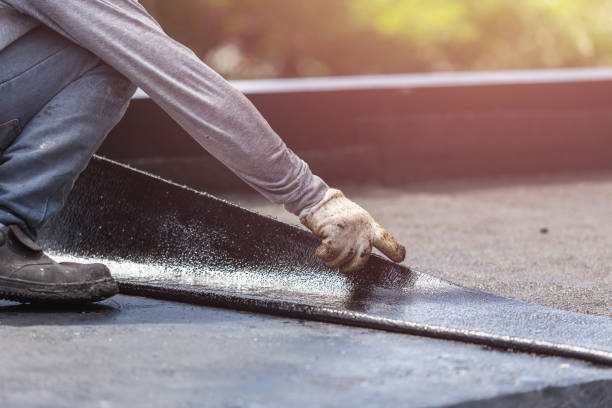 Professional Waterproofing technician working in Burlington, MI